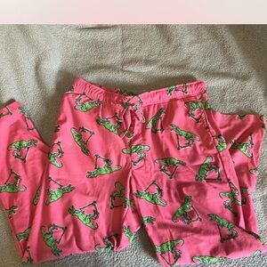 Men’s pink dinosaur pj pants. Dinosaurs riding scooters. Drawstring. L (36-38)